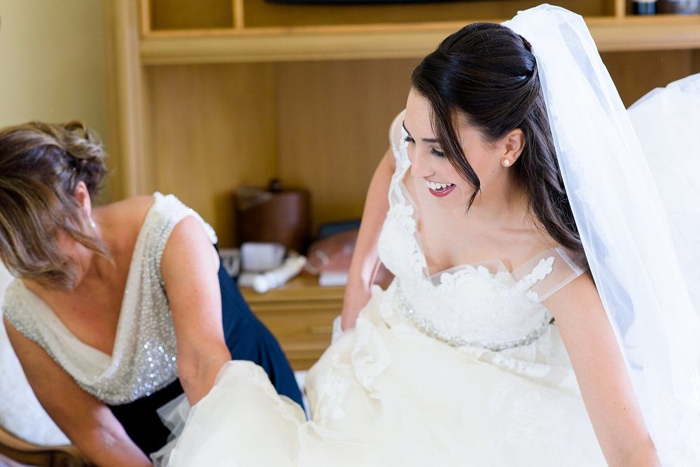 Bride getting dressed at The Biltmore Hotel Miami